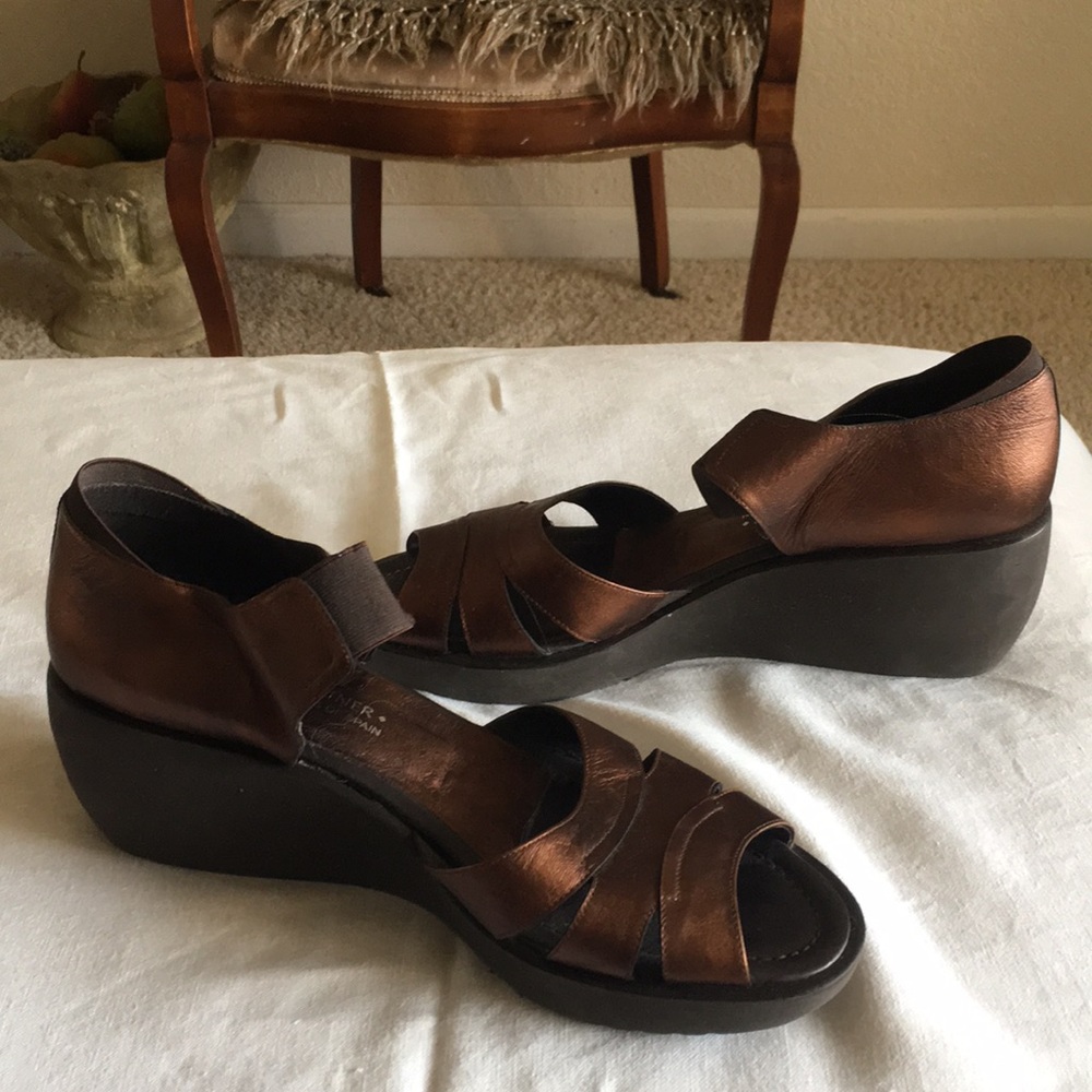 Bronze Donald J Pliner sandals.